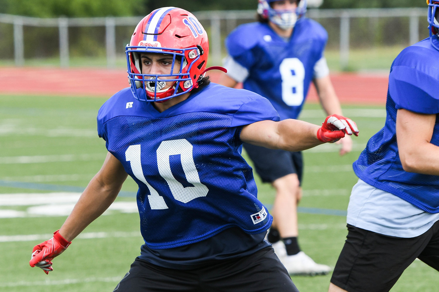 New Hartford’s Tommy Vitagliano defends a receiver during a recent practice. Vitagliano is a top returning starter for the Spartans, who have moved up to Class A in Section III this fall.