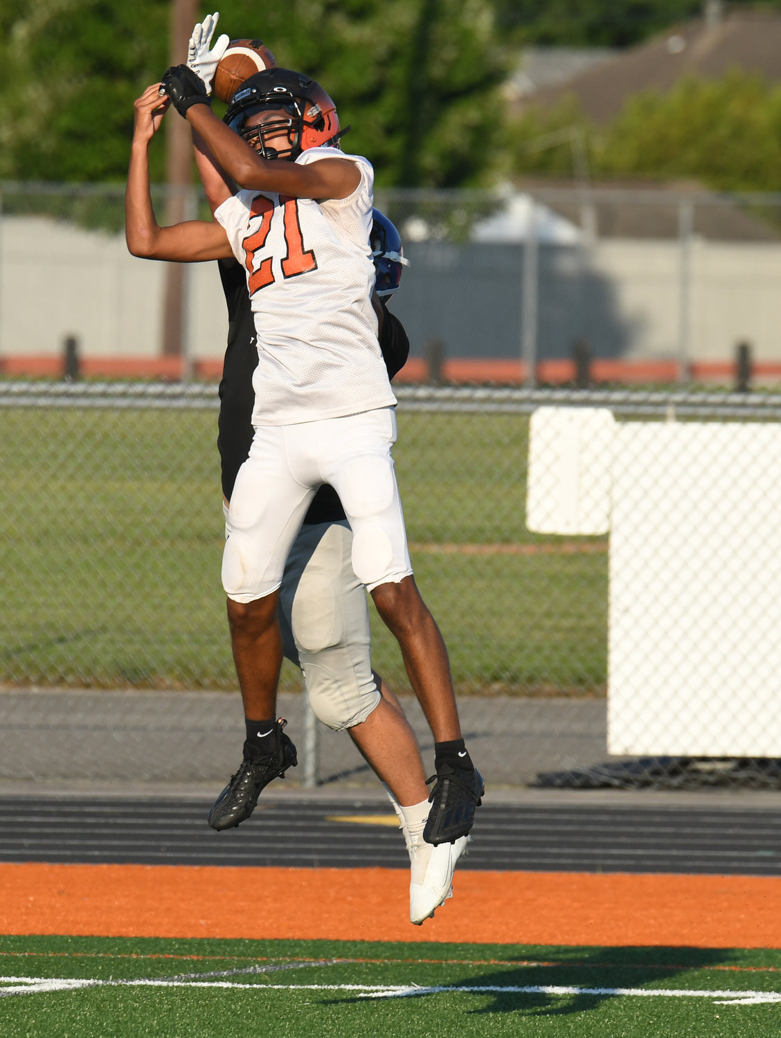 Rome Free Academy junior Matthew Lambert breaks up a pass during a seven-on-seven scrimmage with Camden on Aug. 29.