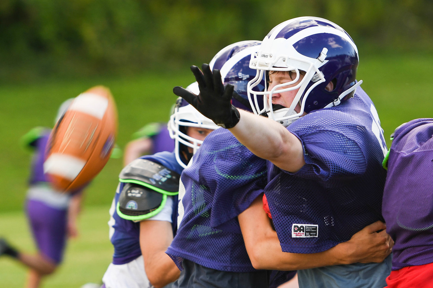 Little Falls senior lineman Dylan Mullen reaches out to block a punt during practice on Aug. 31.