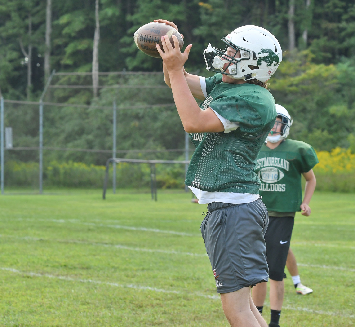 Westmoreland/Oriskany senior defensive end Mitchell Holmes makes an interception during morning drills on Aug. 25.