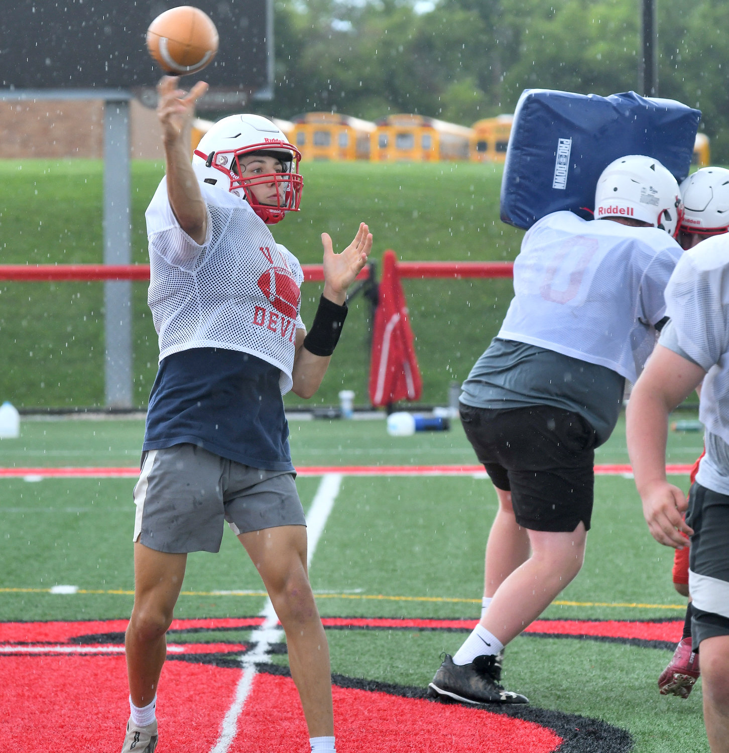 Vernon-Verona-Sherrill quarterback Charlie Foster throws down field at Sheveron Field in practice. Foster is new to varsity but battling for the starting job.