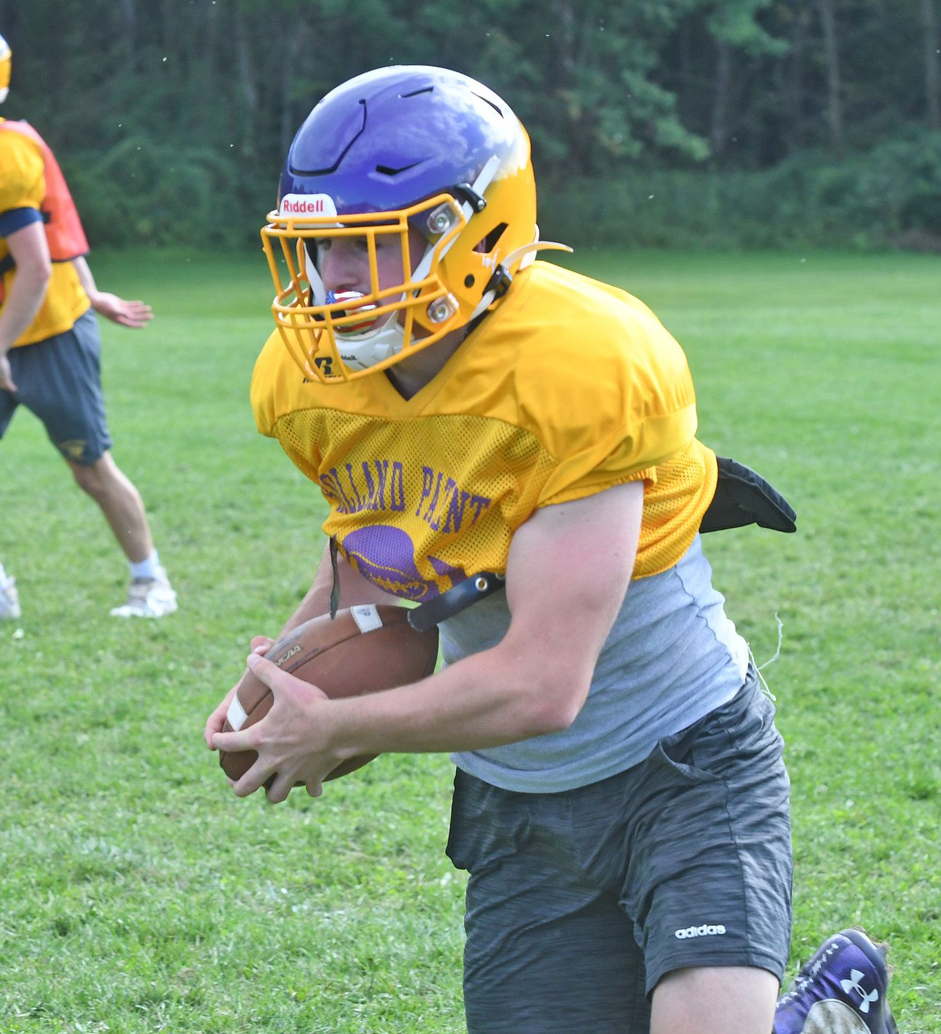 Holland Patent senior running back Jordan Koenig runs after making a catch during practice at the high school in preseason. Koenig is expected to be an impact player on offense and as an inside linebacker on defense.