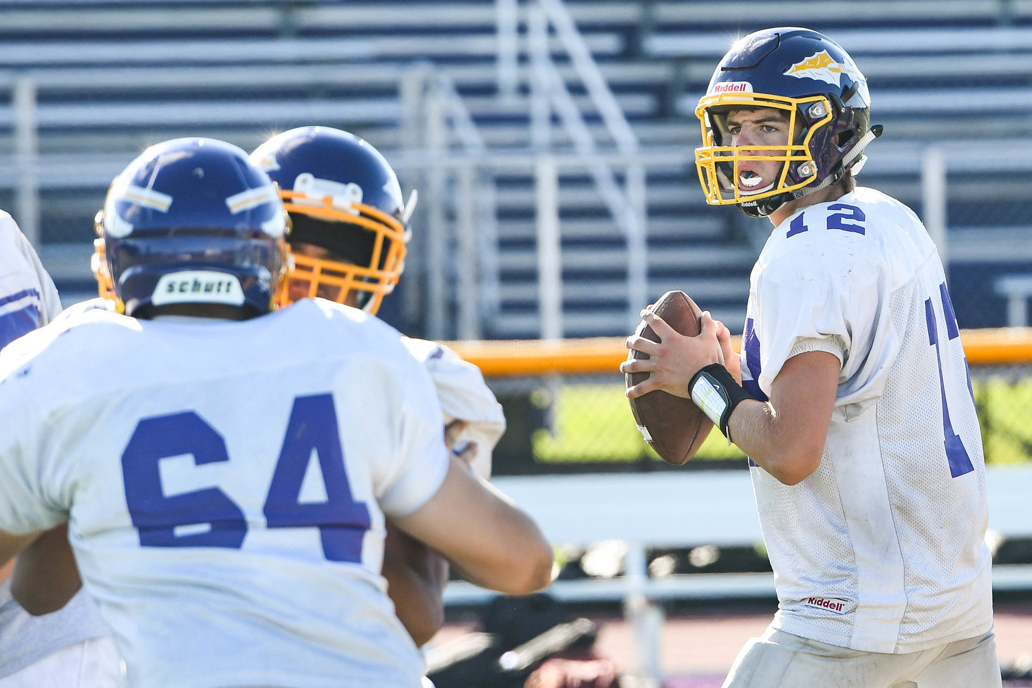 Waterville quarterback Kane Patterson prepares to throw a pass during practice earlier this month. Patterson is a key returning player for the team.