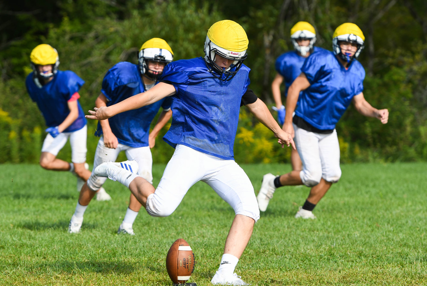 Dolgeville players work on special teams with onside kicks during a morning practice on Aug. 25.