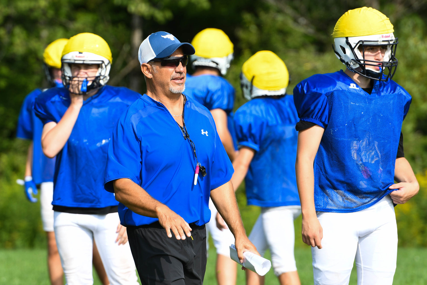 Dolgeville head coach Daniel Zilkowski works with players on kickoff drills during a morning practice on Aug. 25.