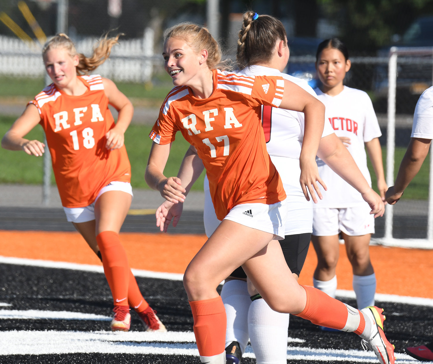 Amelia Furbeck runs away from the goal after scoring Rome Free Academy’s first goal of the game against Utica Proctor Thursday at RFA Stadium. She scored twice and the Black Knights won 10-0.