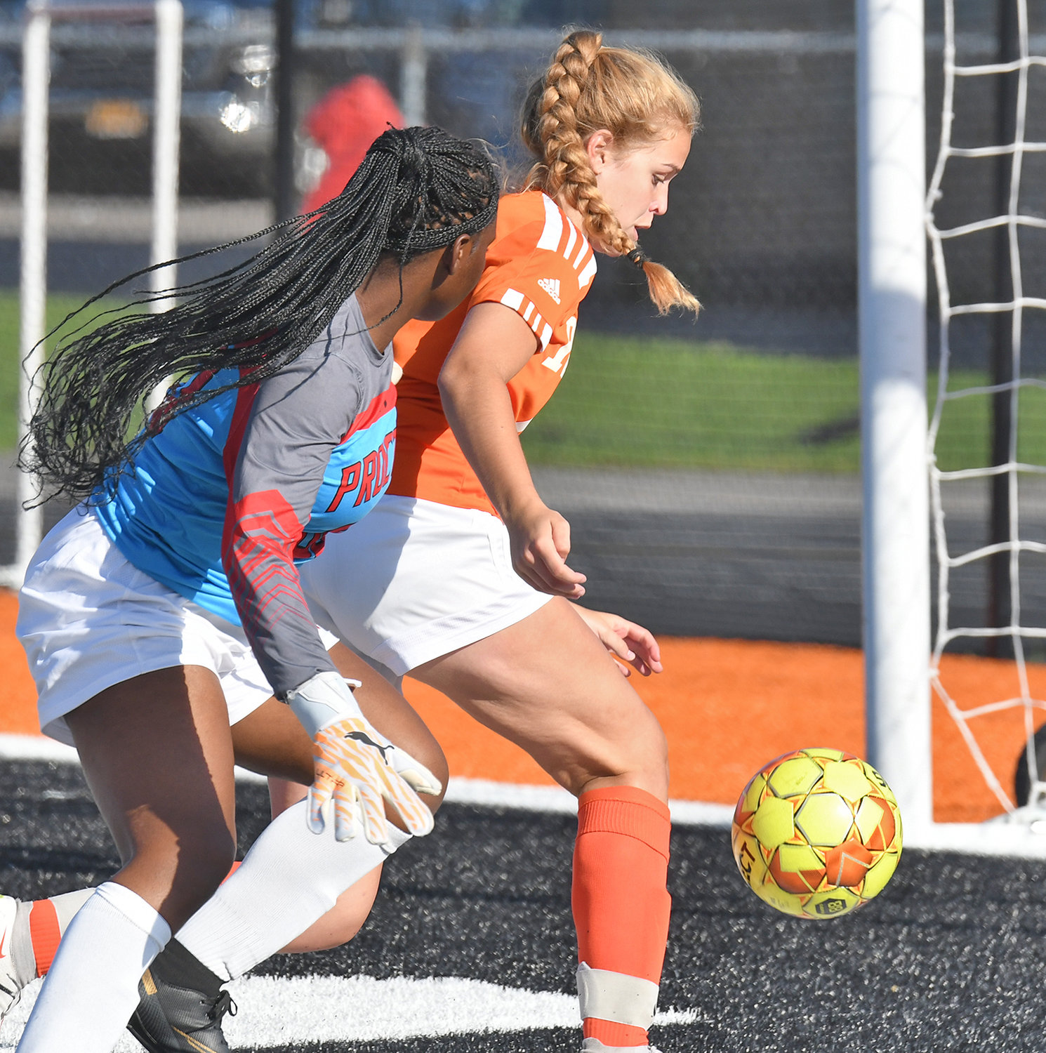 Rome Free Academy's Amelia Furbeck gets behind the Utica Proctor goalie to score RFA's first goal Thursday night at RFA Stadium. She tallied twice for the Black Knights and the hosts won 10-0.