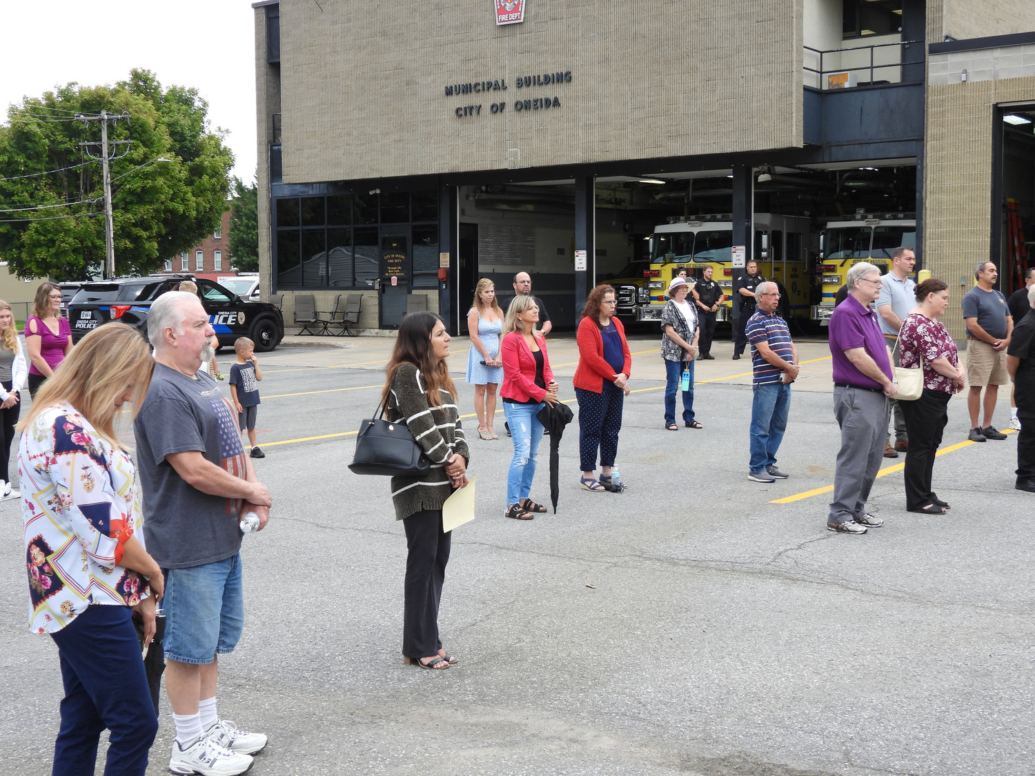 People gather for the city of Oneida's 9/11 Remembrance Ceremony on Sunday to pay homage to those that lost their lives that fateful day and never forget.