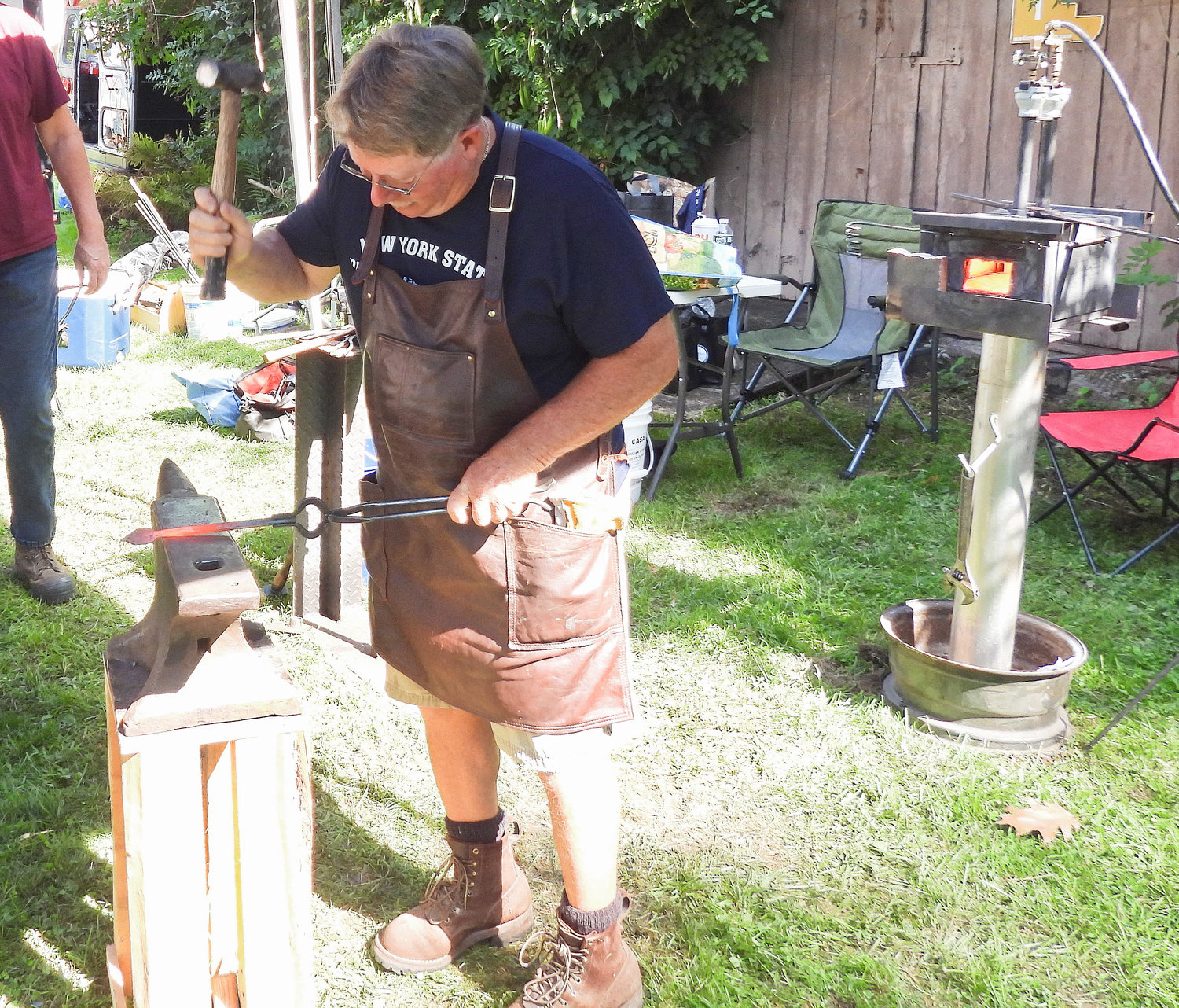 The 58th Annual Madison County Craft Festival saw artisans of every craft under the sun selling their wares at the Madison County Historical Society in Oneida on Saturday, Sept. 10. The New York State Designer Blacksmiths demonstrate how to shape and bend metal.