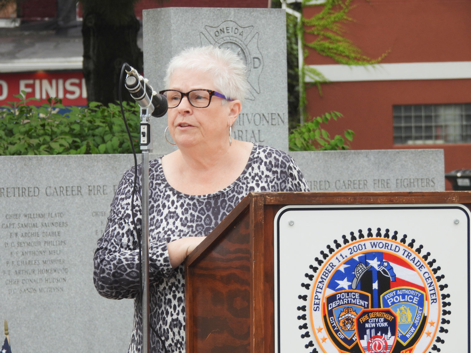Mayor Helen Acker speaks at the city of Oneida's 9/11 Ceremony on Sunday, asking people to never forget what happened on that fateful day