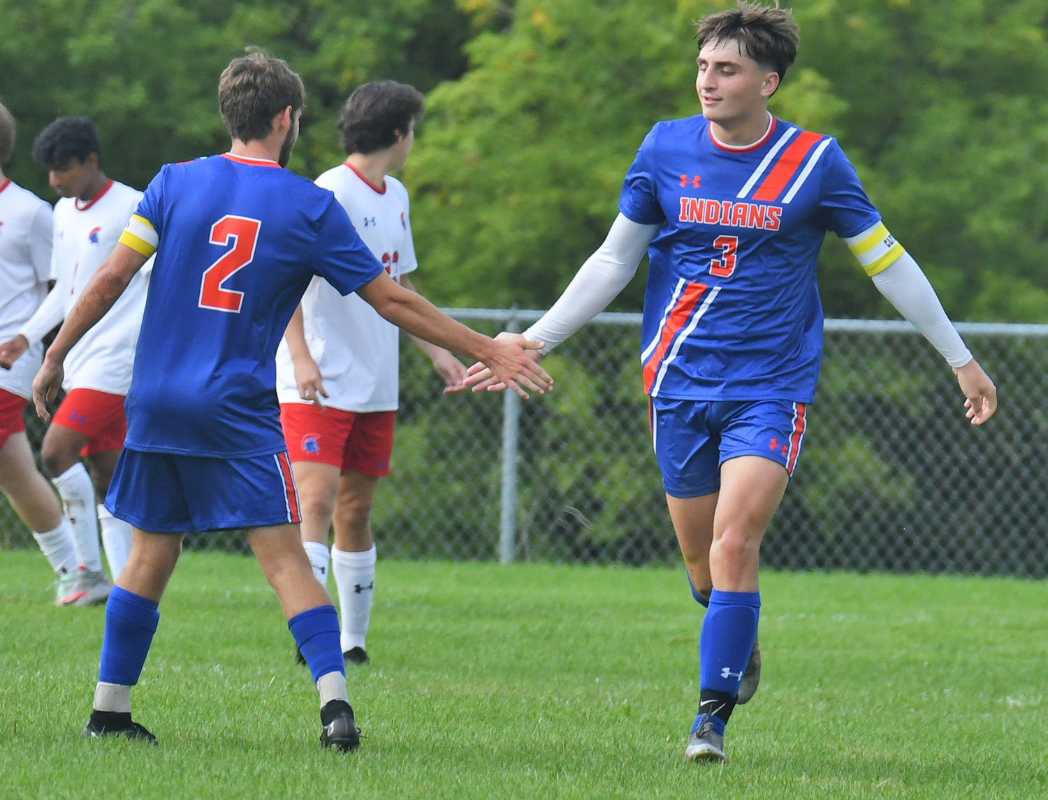 Oneida soccer players Andrew Hicks, right, and Ryan Hughes celebrate the first goal of the game scored by Hicks. New Hartford rallied with six unanswered goals to win 6-1 on the road Tuesday.