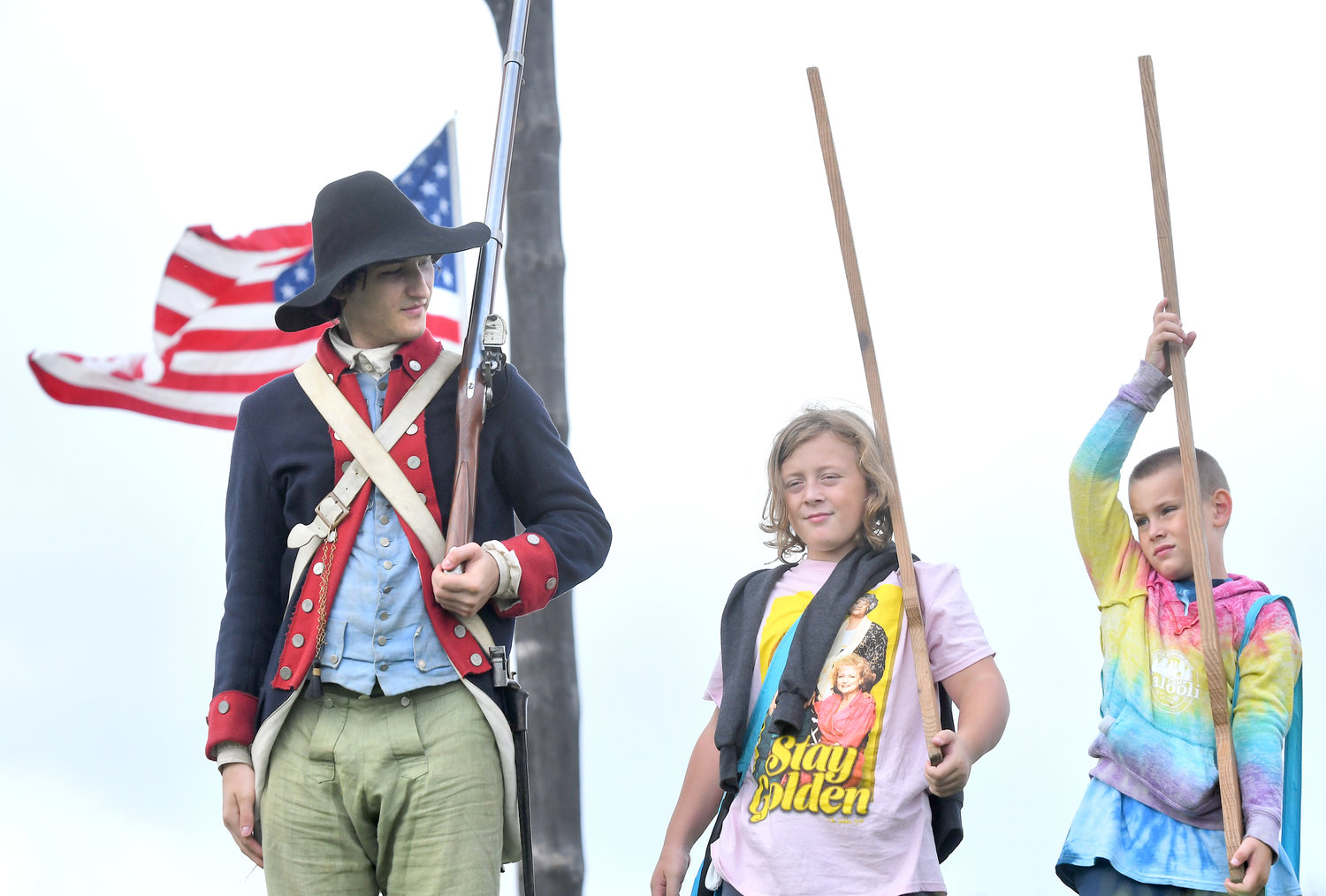 Oliver Lee, 10, and his brother Finnegan, 7, shoulder their 'muskets' under the guidance of 3rd NY Regiment Private Elijah Braun, left, during a musket drill Wednesday at Fort Stanwix in Rome during its Homeschool Day.