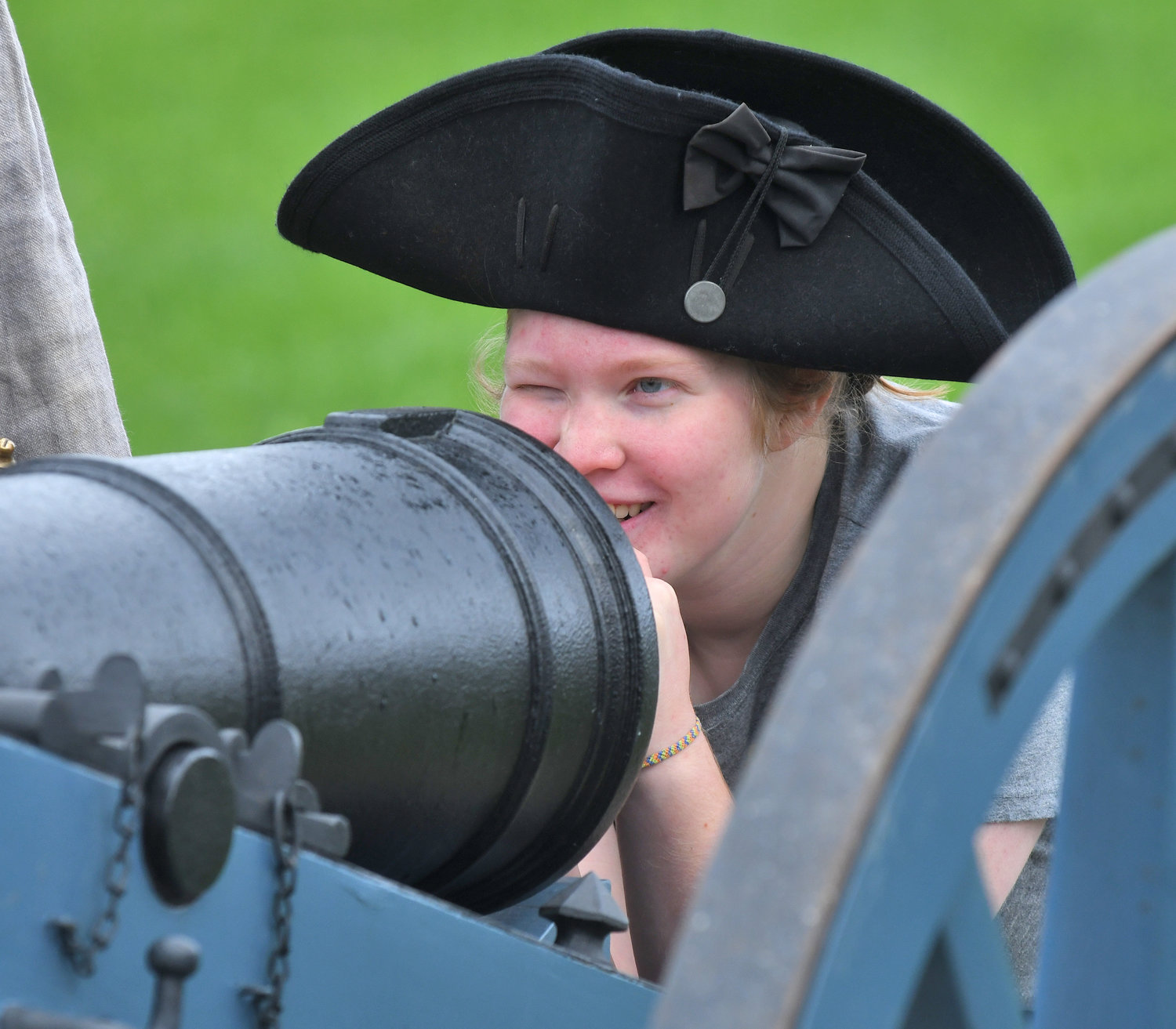 Grace Logue, 16, takes aim during a cannon demonstration Wednesday at Fort Stanwix in Rome. A large group of home schooled children visited the fort all day.