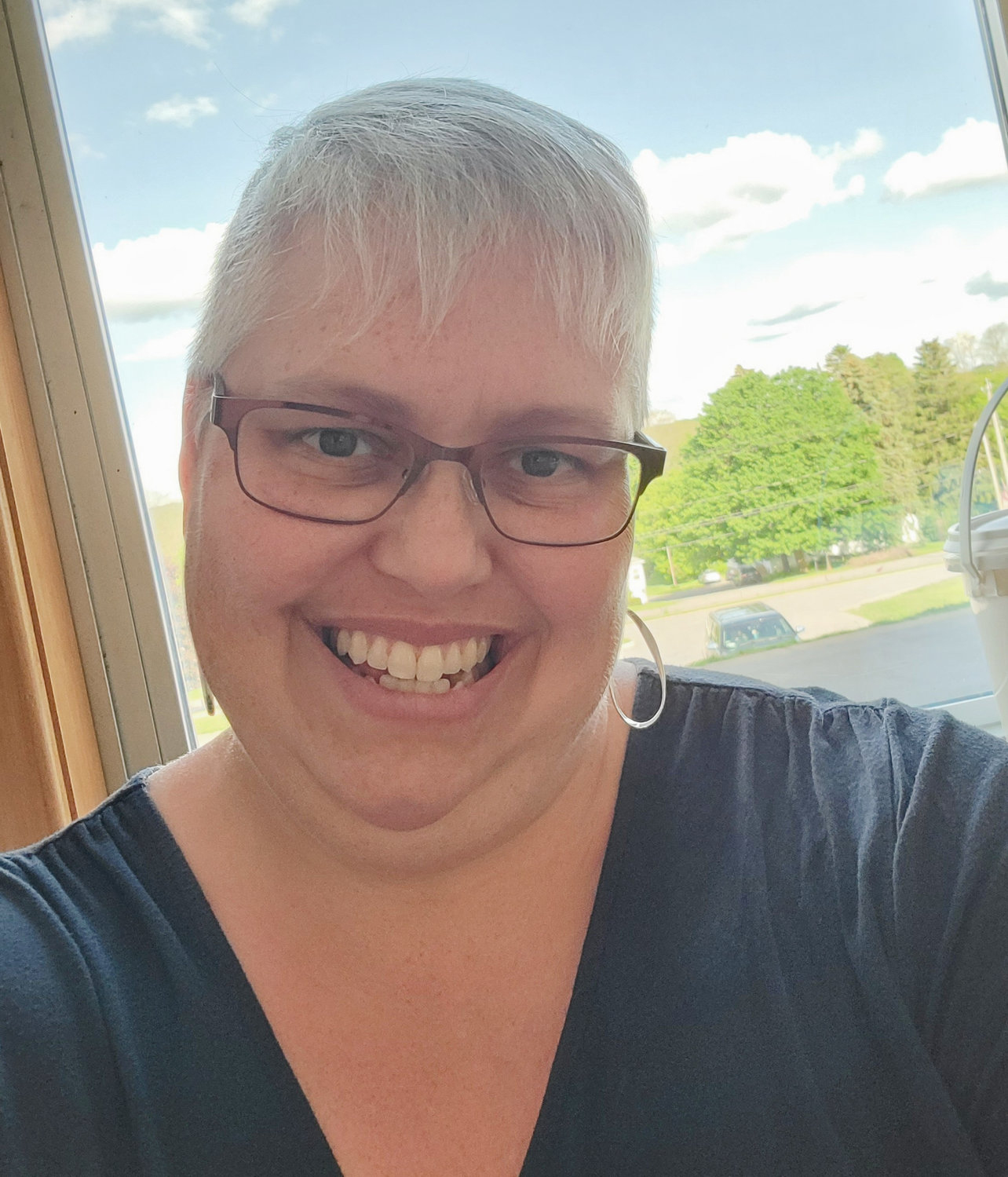 Deborah Stell is pictured, having recovered from chemotherapy. But as a result, her hair became white â something that doesn't get her down and instead delights h