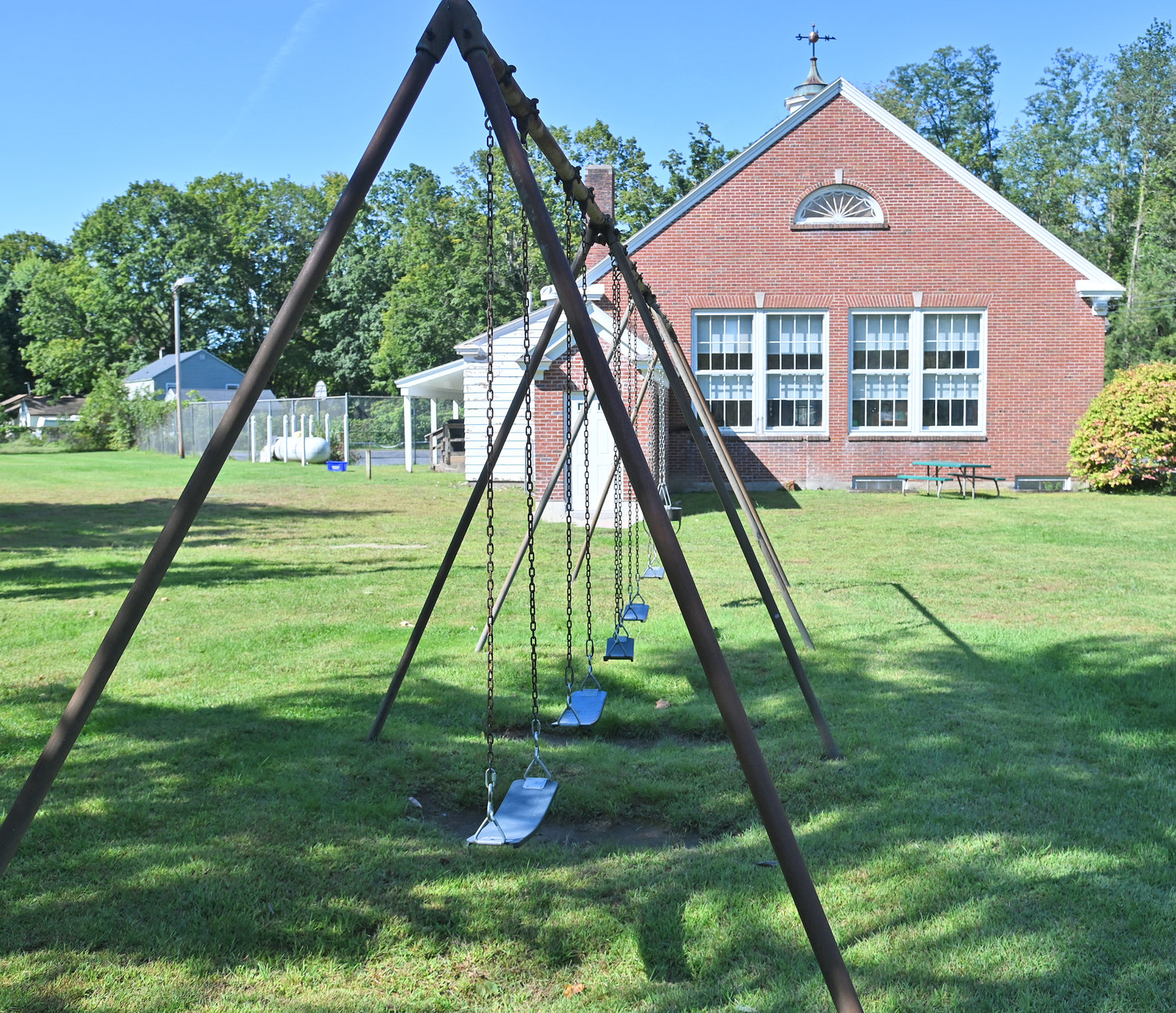 Playground equipment and swings in Westernville next to the Western Town Library Thursday, September 15.