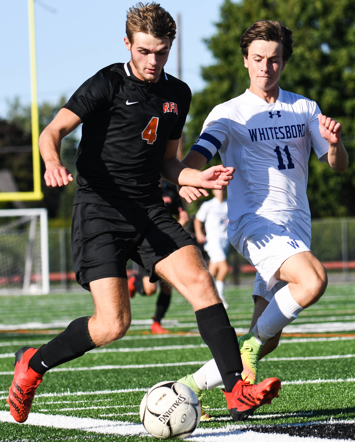 Rome Free Academy forward Gavin Civitelli, left, moves the ball as Whitesboro's Daschel Smith defends during the game on Thursday. The Black Knights won 4-1 at home.