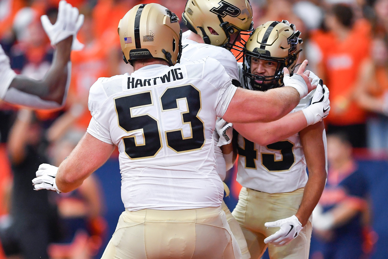 Purdue running back Devin Mockobee, right, celebrates with offensive lineman Gus Hartwig after scoring a touchdown against Syracuse during the first half of an NCAA college football game in Syracuse, N.Y., Saturday, Sept. 17, 2022.
