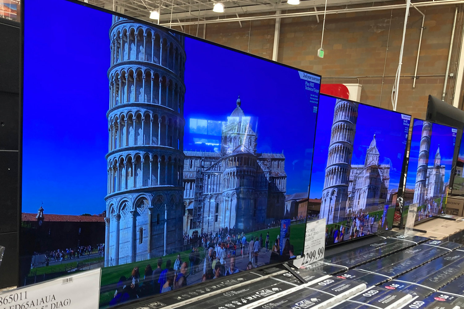 A 65-inch television is shown at a warehouse in this June 2021 file photo. Buy now, pay later loans allow users to pay for items such as new sneakers, electronics or luxury goods in installments.