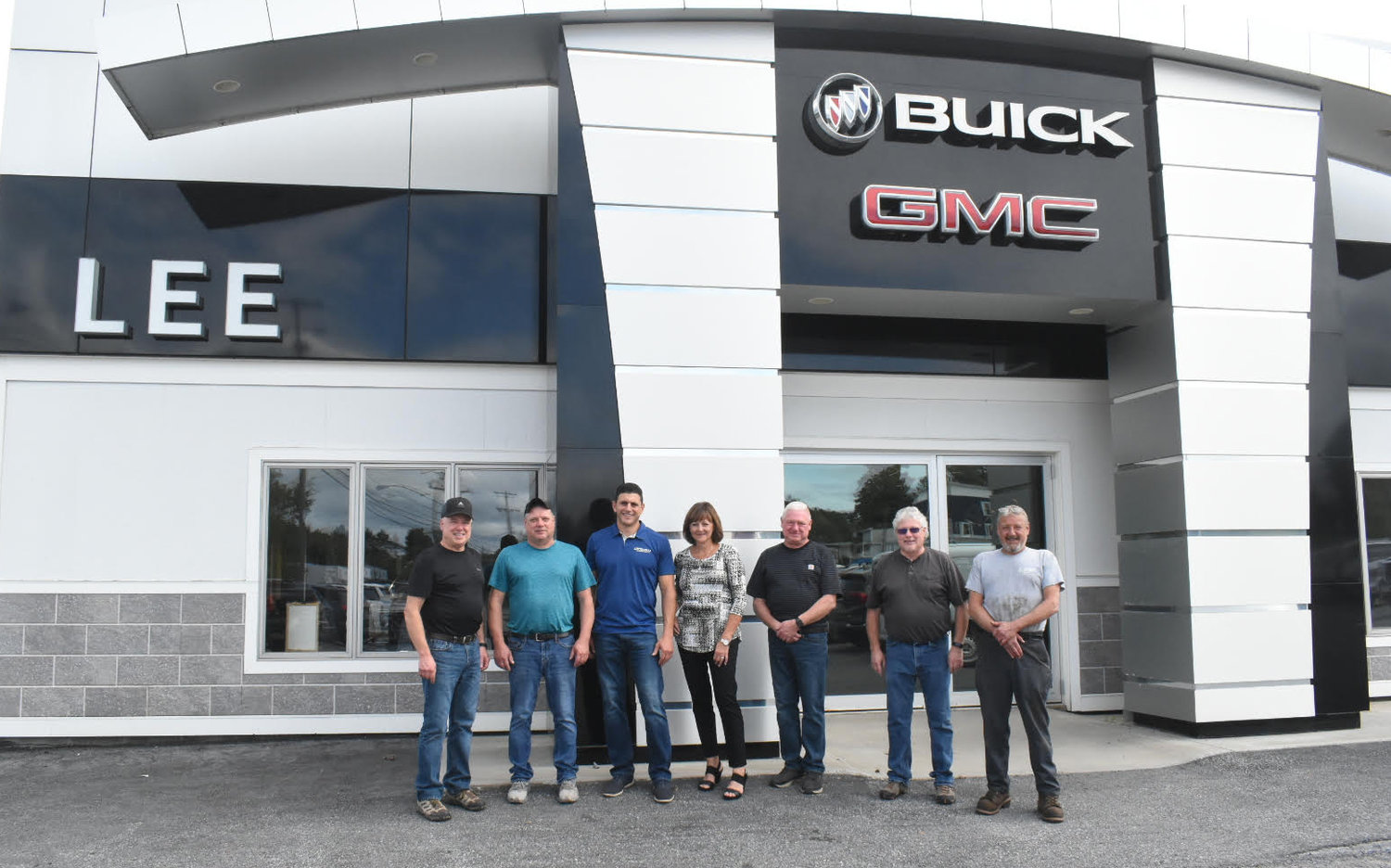 Steering a new course into the future, Matt Nimey Buick GMC has announced that it has acquired Lee Buick GMC Trucks, effective Monday, Sept. 19. From left: Randy Lee, Robert Lee, Matt Nimey, Cindy Nimey, Rick Lee, Michael Lee, and Rodney Lee. The Lee brothers are the sons of Gladys and the late Dick Lee, who founded the business with his father Gus Lee in the early 1960s.