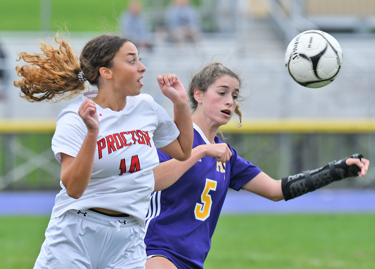 Proctor’s Kaia Singleton and Holland Patent’s Makenzie Stalker try to get position on the ball late in the first half during Tuesday’s Tri-Valley League game in Holland Patent. Golden Knights won 2-0 as Pazia Grocholski and Brianna Mullins each scored a goal.