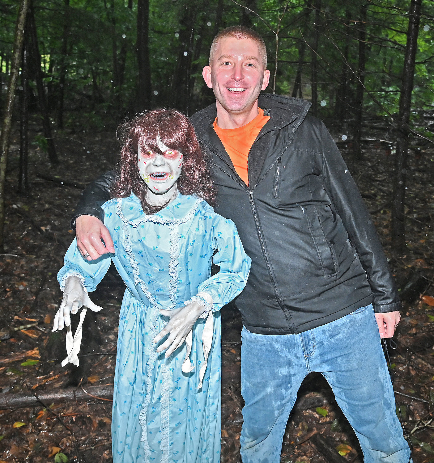 Haunting in the Woods trail creator Bert van der Werff, 3200 Forward Road, Blossvale, poses with the Regan MacNeil character from the Exorcist movie along his wooded trail, full of monsters and characters from horror movies. The Halloween trail opens to the public on Sept. 29.