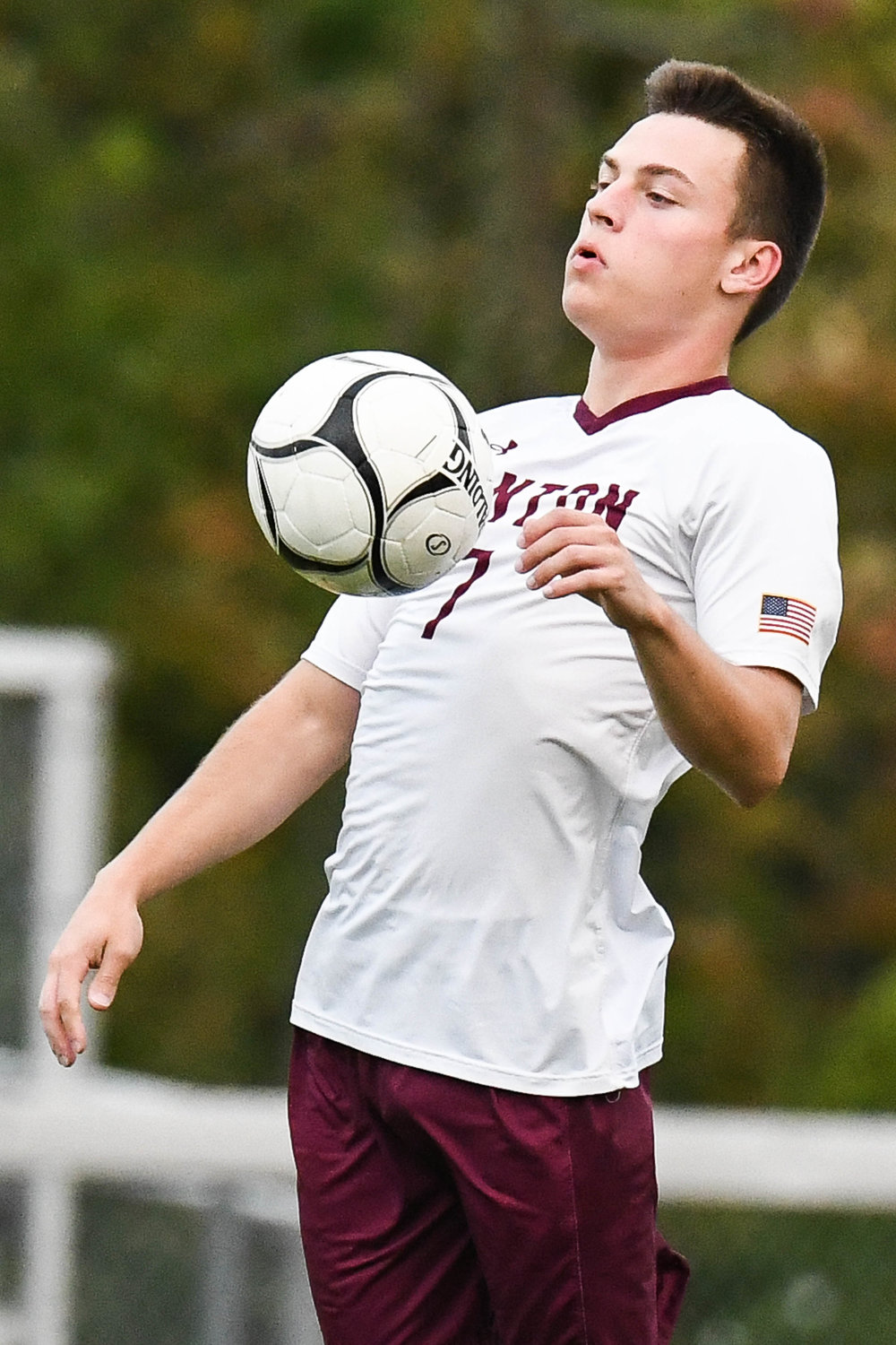Clinton player Jakob Whitfield settles the ball with his chest during the game against Little Falls on Tuesday. Clinton lost 3-1 on the road.