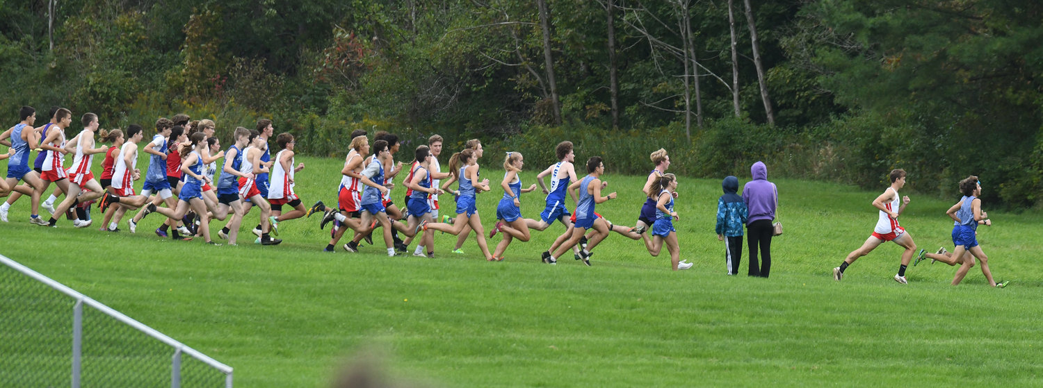 Start of varsity boys and girls cross country race at Holland Patent on Tuesday.