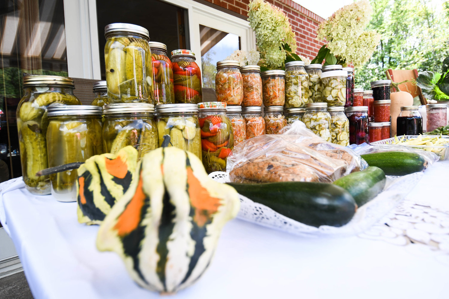 Sophie Bartoszek cans a variety of fruits and vegetables from her garden at home in Marcy. She also cans traditional Polish meats.