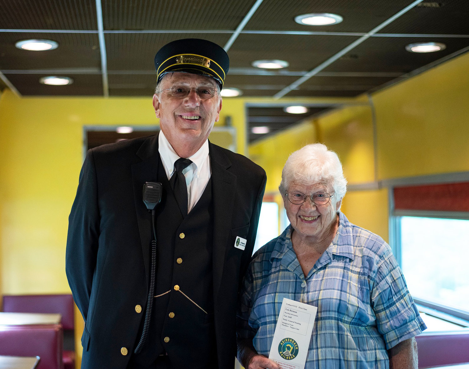 TRAIN CONDUCTOR AND VOLUNTEER - Al Heywood, Adirondack Railway Preservation Society Board member and train conductor, with Lois Borman, a 30-year volunteer.