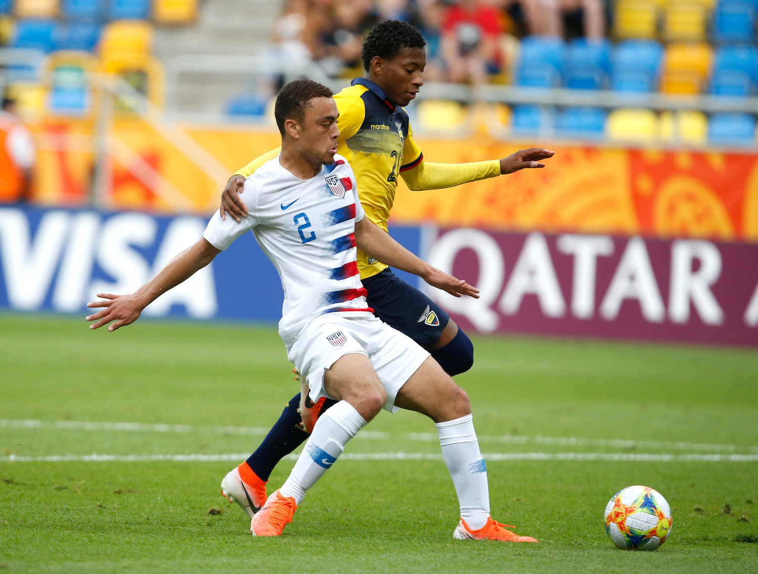 In this June 8, 2019, file photo, United States' Sergino Dest, left, and Ecuador's Gonzalo Plata challenge for the ball during a quarterfinal soccer match at the U20 World Cup in Gdynia, Poland. Sergi√±o Dest is set to become the first American to play for AC Milan in Serie A after the Italian champion signed the defender on loan from Barcelona on Thursday, Sept. 1, 2022, shortly before the transfer window shut.