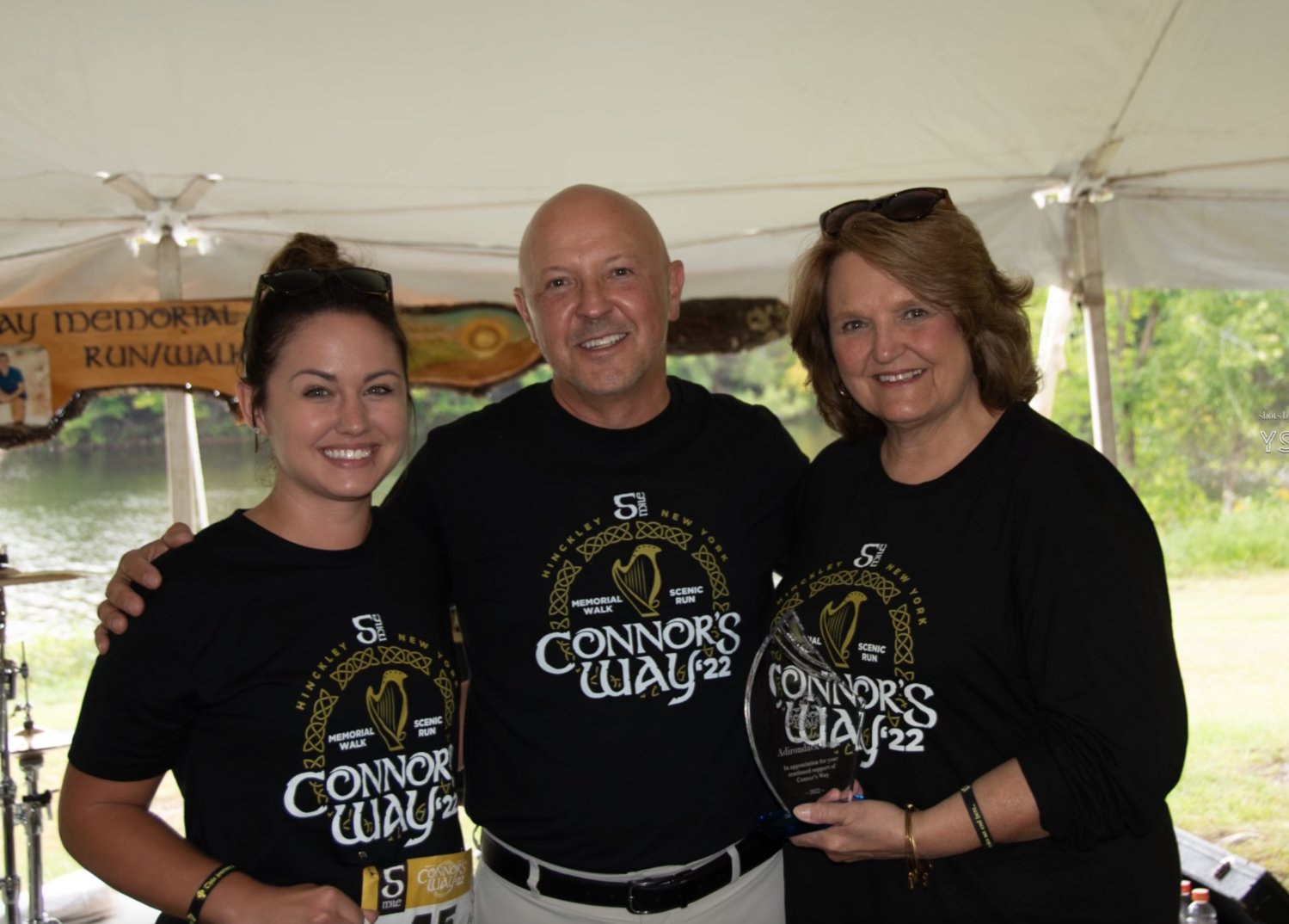 Special recognition at the The Connor’s Way Run/Walk, was given to Adirondack Bank, a top sponsor for all five years of Connor’s Way with a plaque presentation by Race Director Don Lynskey, center, to bank representatives Debbie Cotton and Kristen Bourgeois.