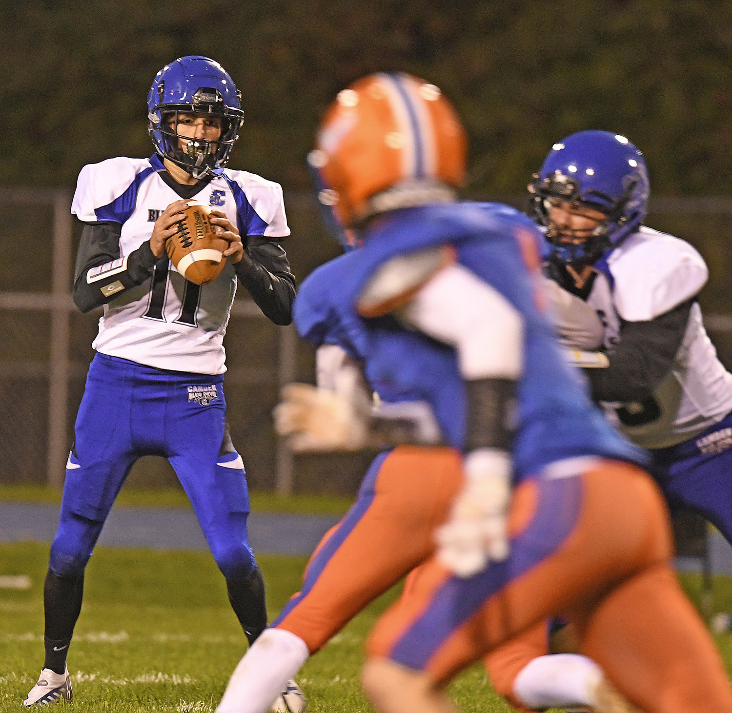 Camden QB Connor Dean looks for a receiver in the first quarter Friday night in Oneida. Dean finished with four total touchdowns in a 39-20 win.