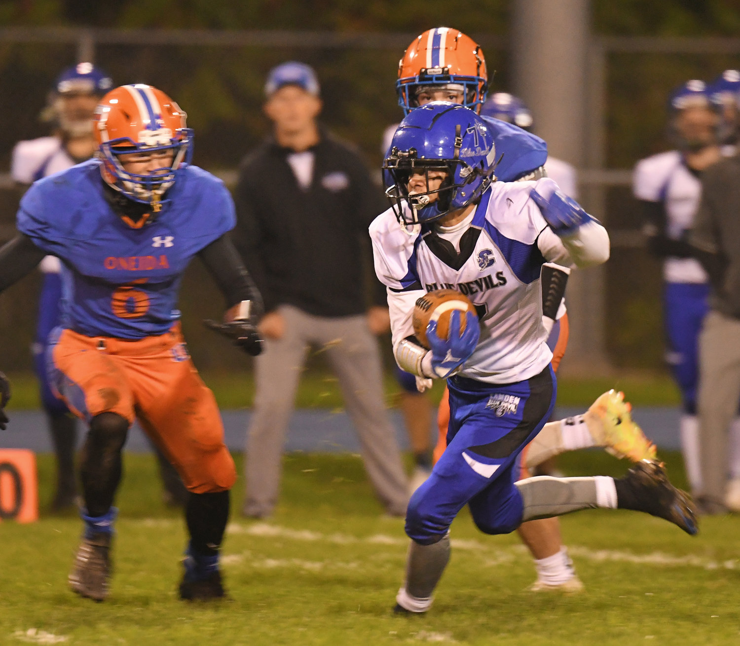 Camden's Trey Kimball weaves through traffic for some of his 85 rushing yards on Friday against Oneida. Kimball also had a touchdown in Camden's 39-20 victory to improve to 3-0.
