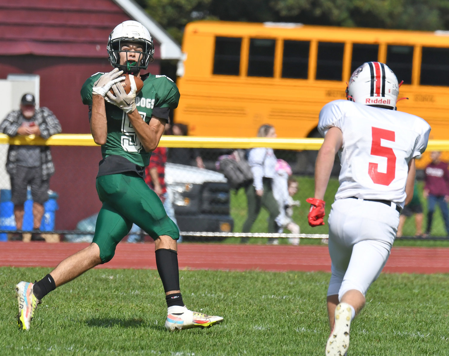 Westmoreland/Oriskany's Cameron Rautenstrauch catches a long pass to set up a touchdown on Saturday afternoon against Vernon-Verona-Sherrill at Bernie Block Field in Oriskany. VVS won 49-14.