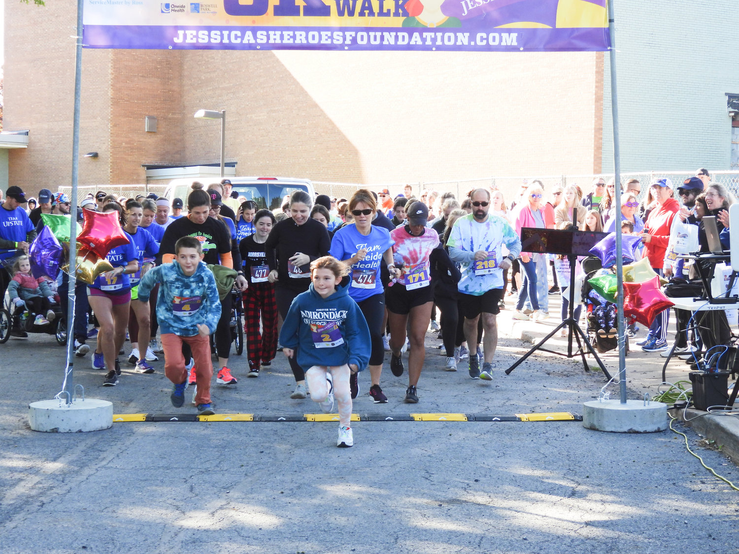 Men, women, and children take off for the Jessica's Heroes 5K Run on Saturday, Sept. 24 at Oneida High School.