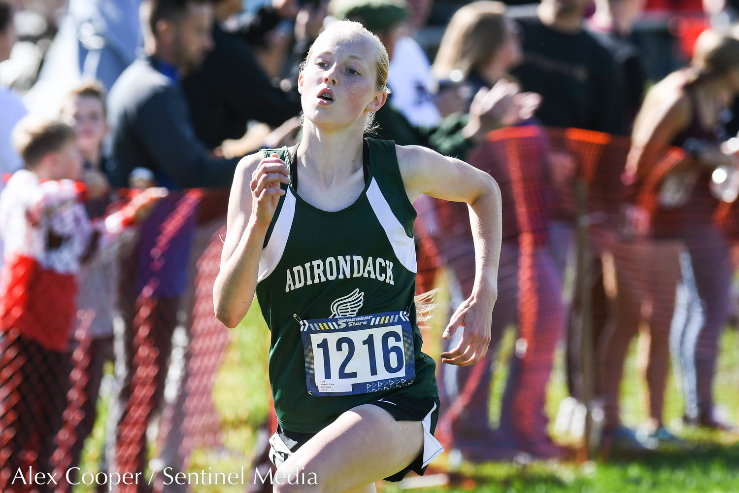 Adirondack runner Cora Hinsdill places first during the 79th EJ Herrmann XC Invitational on Saturday, Sept. 24 at Proctor Park in Utica.