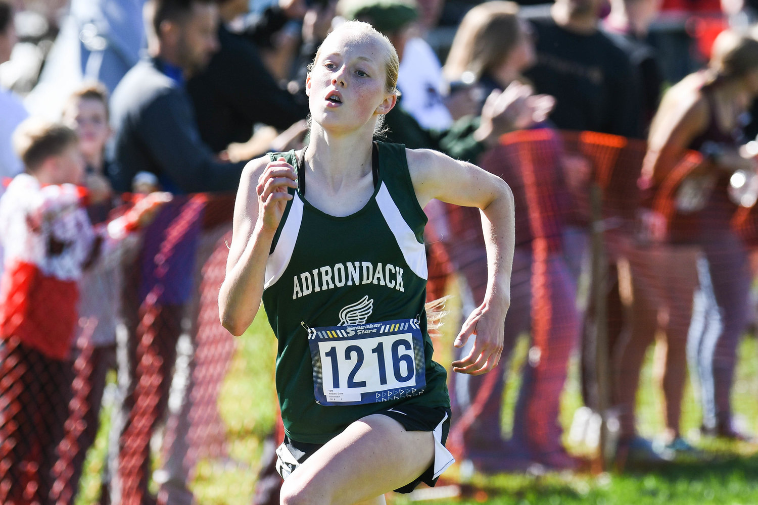 Cora Hinsdill of Adirondack won the girls varsity race at the 79th annual E.J. Herrmann Invitational at Proctor Park in Utica Saturday in 19:58.3 minutes. Her top time helped the Wildcats to a second place finish out of 18 schools.