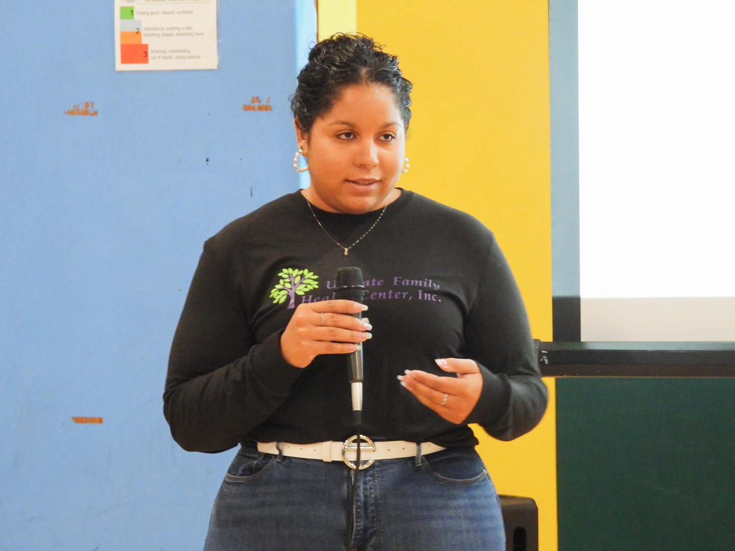 Torie Hairston, director of behavioral health services at Upstate Family Health Center and co-host of the Fair, speaks at the inaugural Community Partner Vendor Fair on Saturday, Sept. 24