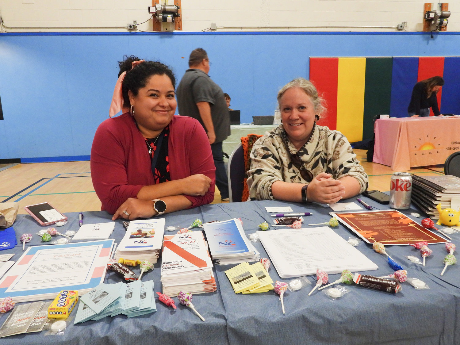 Jahnae Roberts, LMSW, left, and Stacy Bisgrove, LMHC, of The Neighborhood Center, attend the inaugural Community Partner Vendor Fair on Saturday, Sept. 24