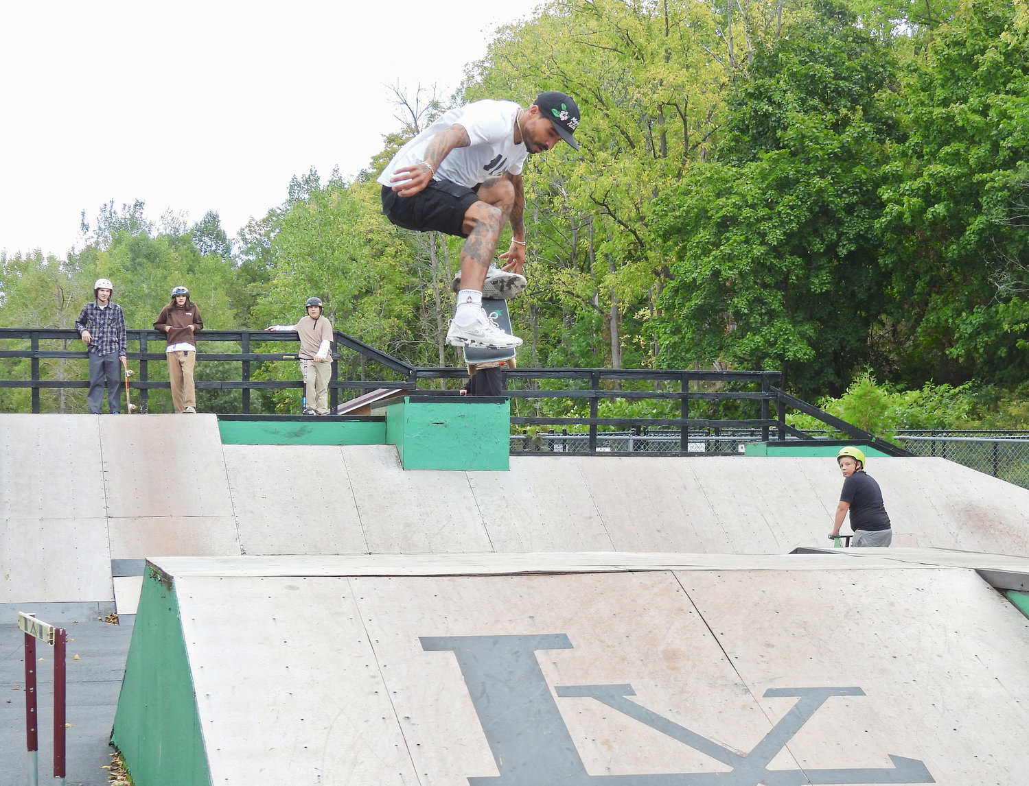 Emanuel "Manny" Santiago launches over a ramp at Lenox Skate Park on Saturday, Sept. 24