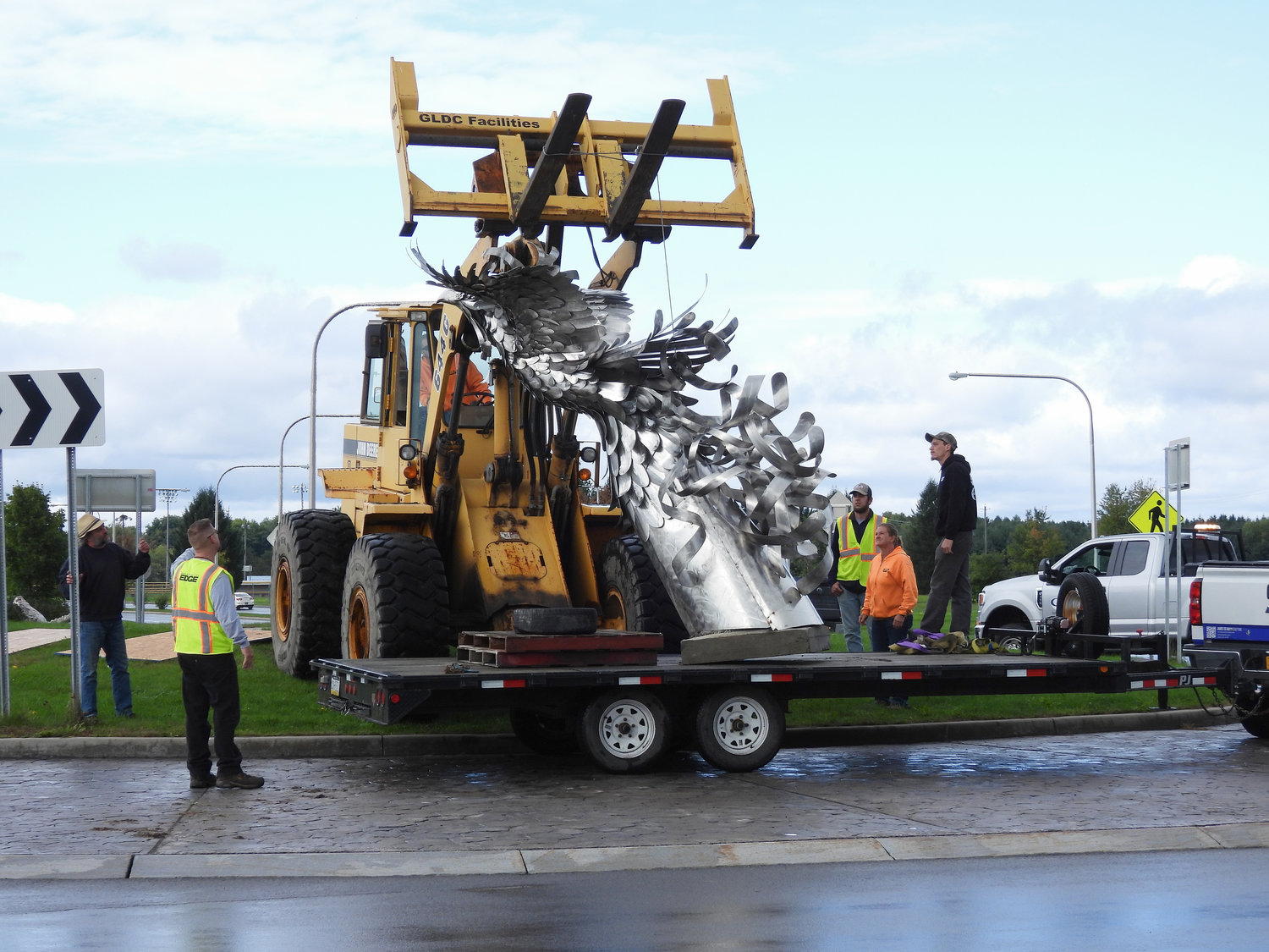 "The Phoenix" by James 'Jay' Seaman rises and goes up for installation at the Hangar Road roundabout in the Griffiss Business & Technology Park on Wednesday, Sept