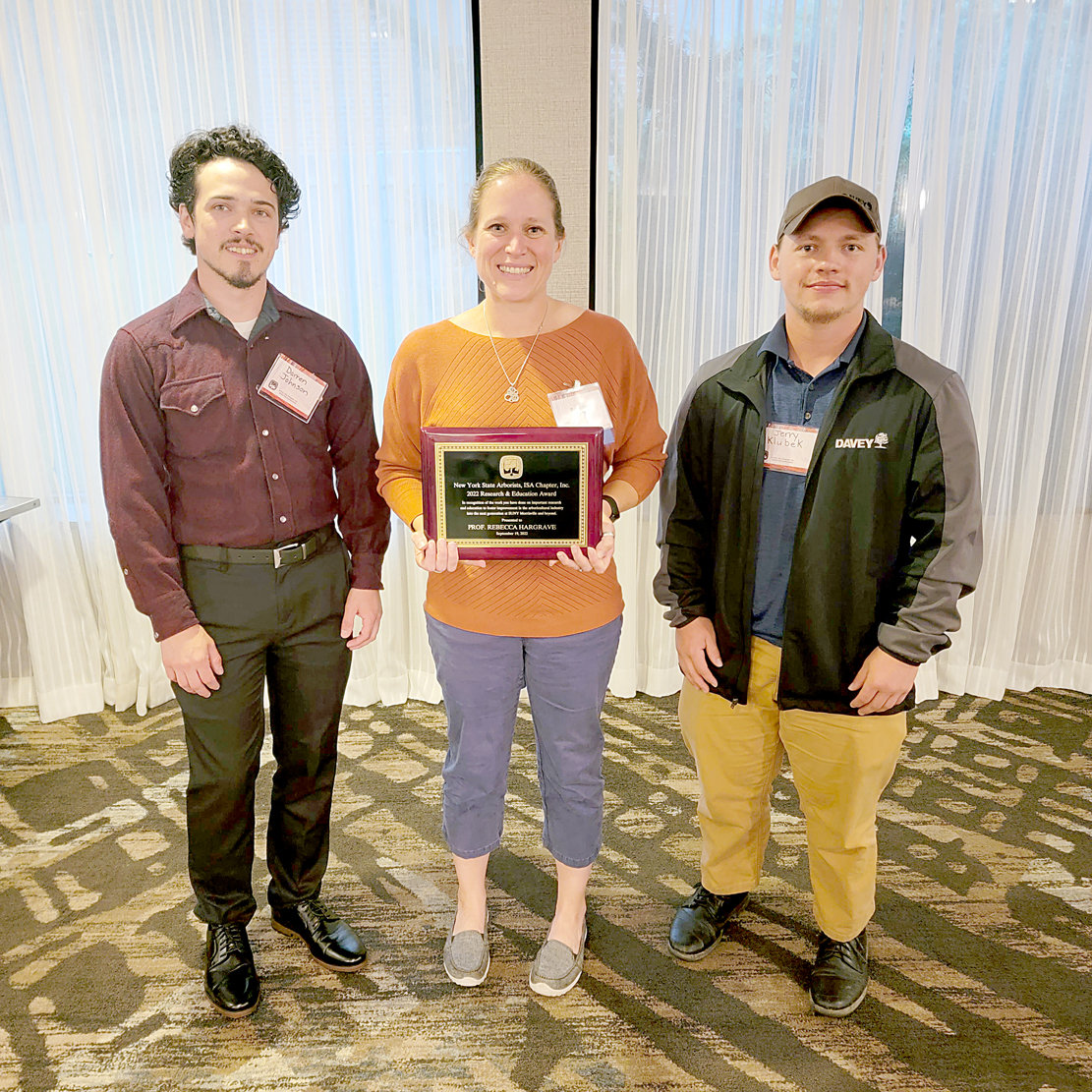 A professor and three students from the State University of New York at Morrisville recently received awards from the New York State Arborists, ISA Chapter. From left: Darren Johnson, a environmental conservation science major; Associate Professor Rebecca Hargrave; and Jerry Klubek, an environmental and natural resources management major. Not pictured is Camberly Van Valkenburg, an environmental and natural resources management major who also received an award.