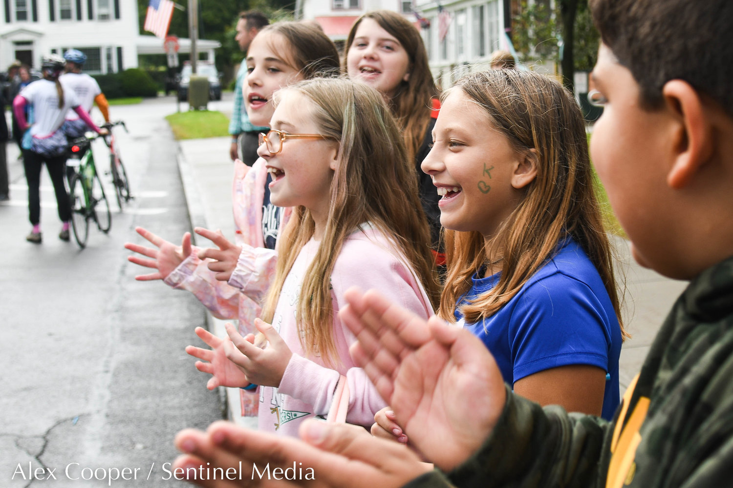 Kids clap and cheer for riders during the 24th annual Ride For Missing Children on Wednesday, Sept. 28 outside of Gregory B. Jarvis Middle School in Mohawk.