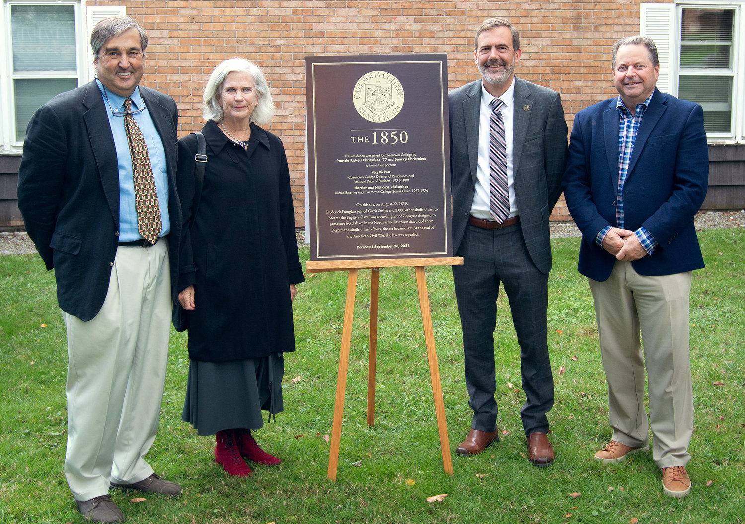 Cazenovia College dedicated the property at 9 Sullivan St. which was recently donated to the college by the Christakos Family, with a formal ceremony on Friday, Sept. 23. From left: Sparky and Patricia Ricket Christakos, donors of the property; David Bergh, Cazenovia College president; and Kenneth C. Gardiner,  chairman of the college’s board of trustees.