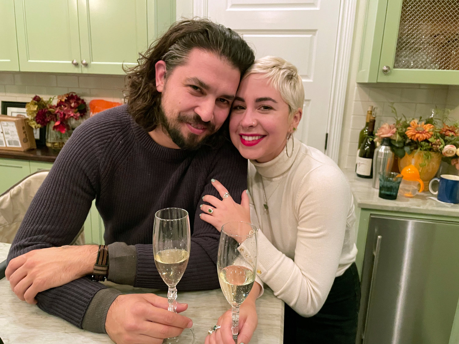 Lena Kazer and Quinn Alvarez on Dec. 28, 2021, in Los Angeles. The two turned to secondhand, reusable and compostable items for their May wedding.