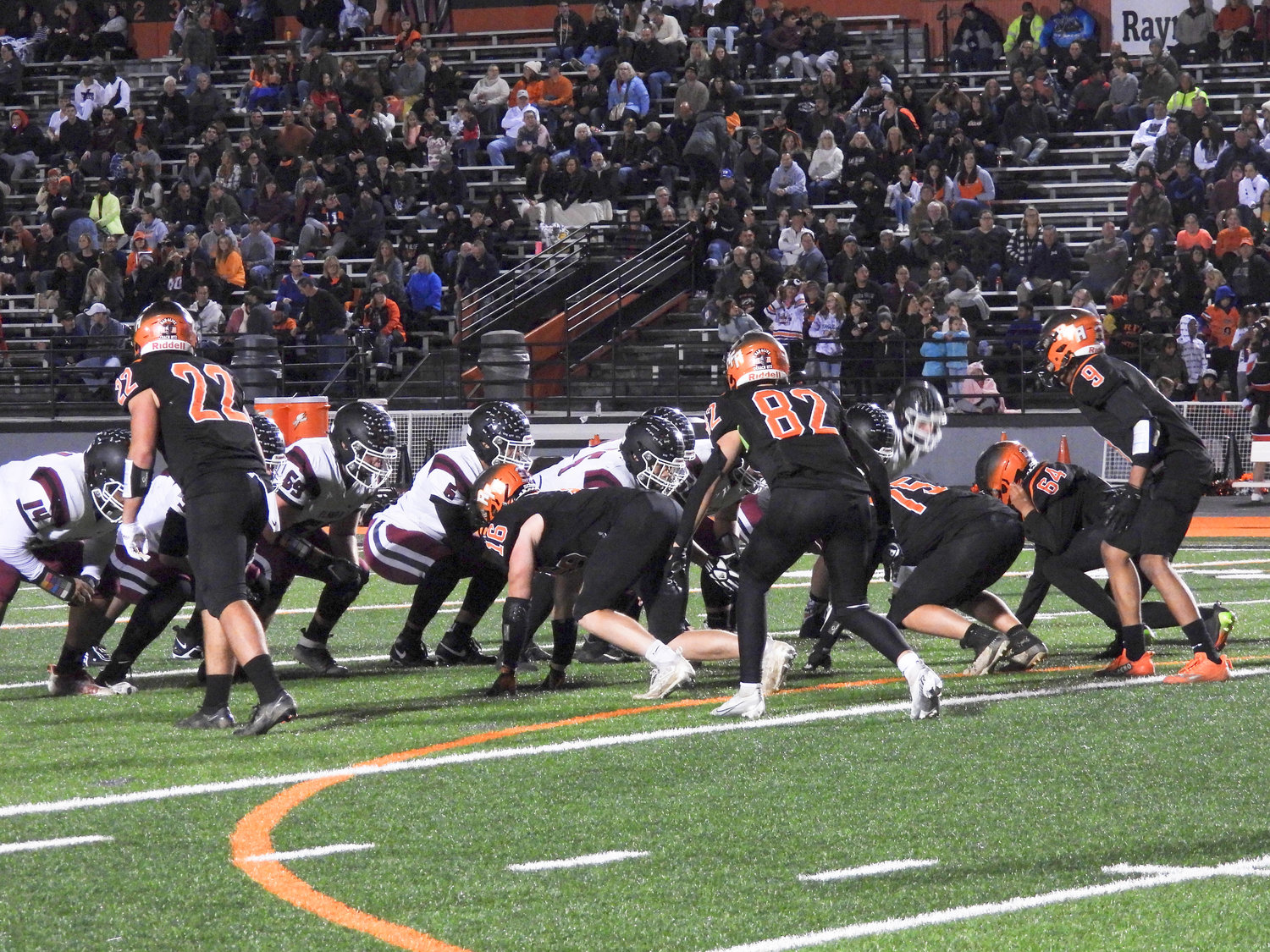 The Rome Free Academy defense awaits the snap against Elmira Friday night at RFA Stadium on Homecoming night. The Black Knights lost 62-28.