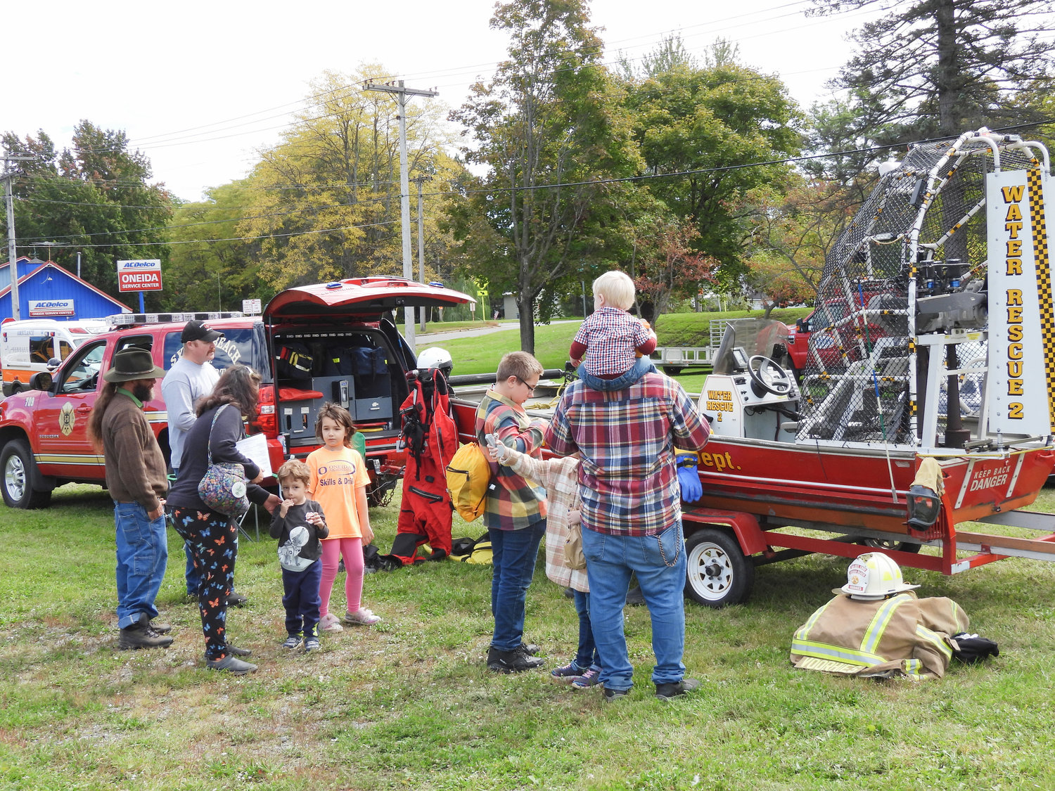 People attending the second annual Oneida Fall Fest on Saturday, Oct. 1 get a look at the Sylvan Beach Fire Department's rescue boat that was once used during the 2013 flood of the Flats.