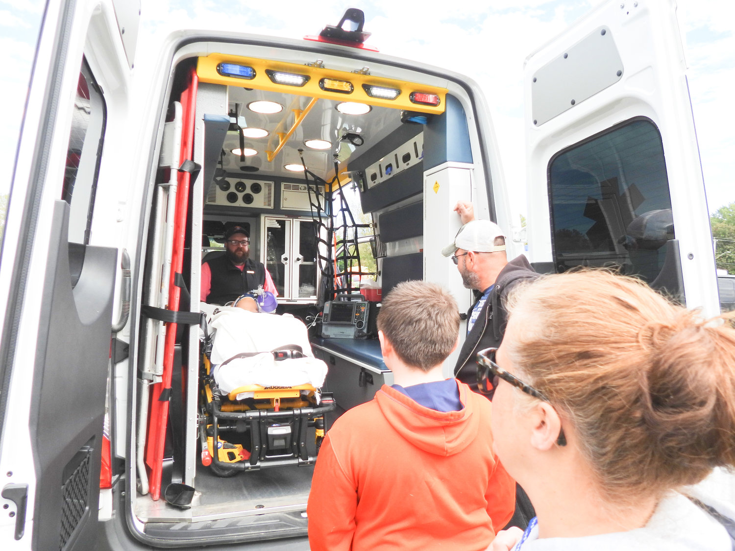 People attending the second annual Oneida Fall Fest on Saturday, Oct. 1 get a look into the back of ambulance owned by Vineall Ambulance.
