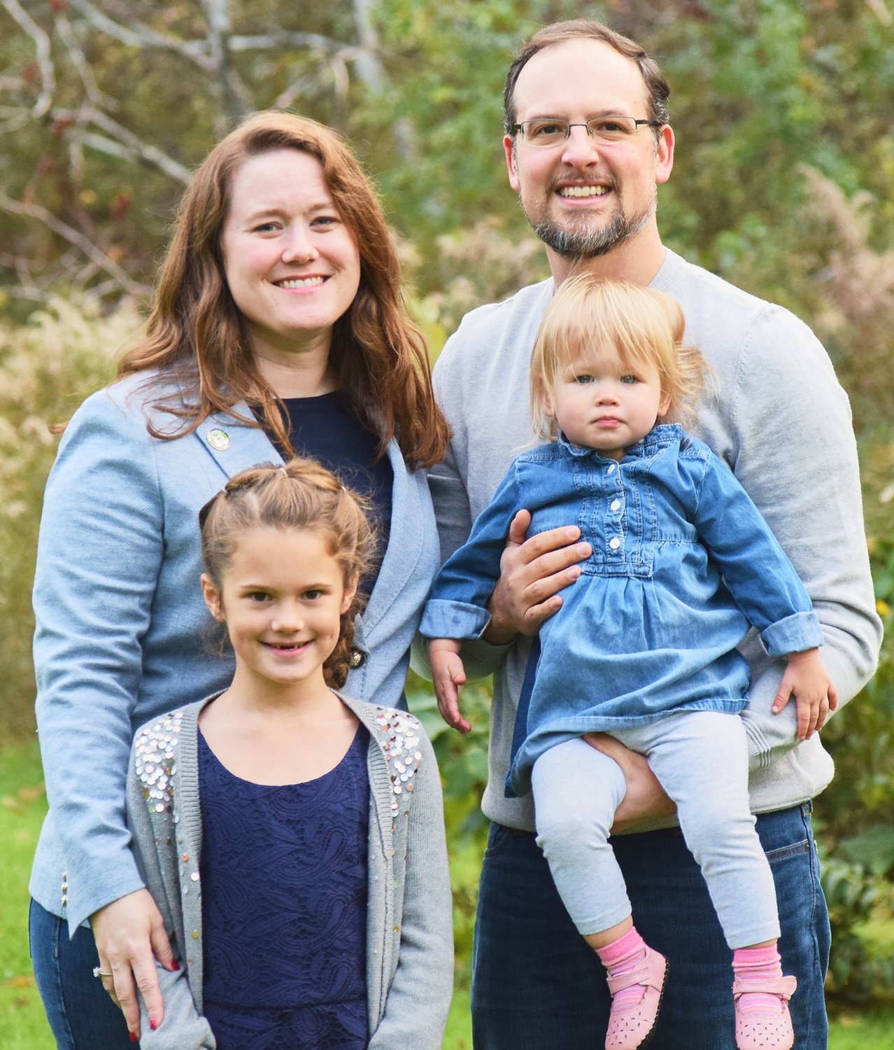 Rhonda Youngs is running for Madison County Judge on a write-in ballot and has received support from the Madison County Democrats, Republicans, and Conservatives. She is shown above with husband, Jim, and their two children.