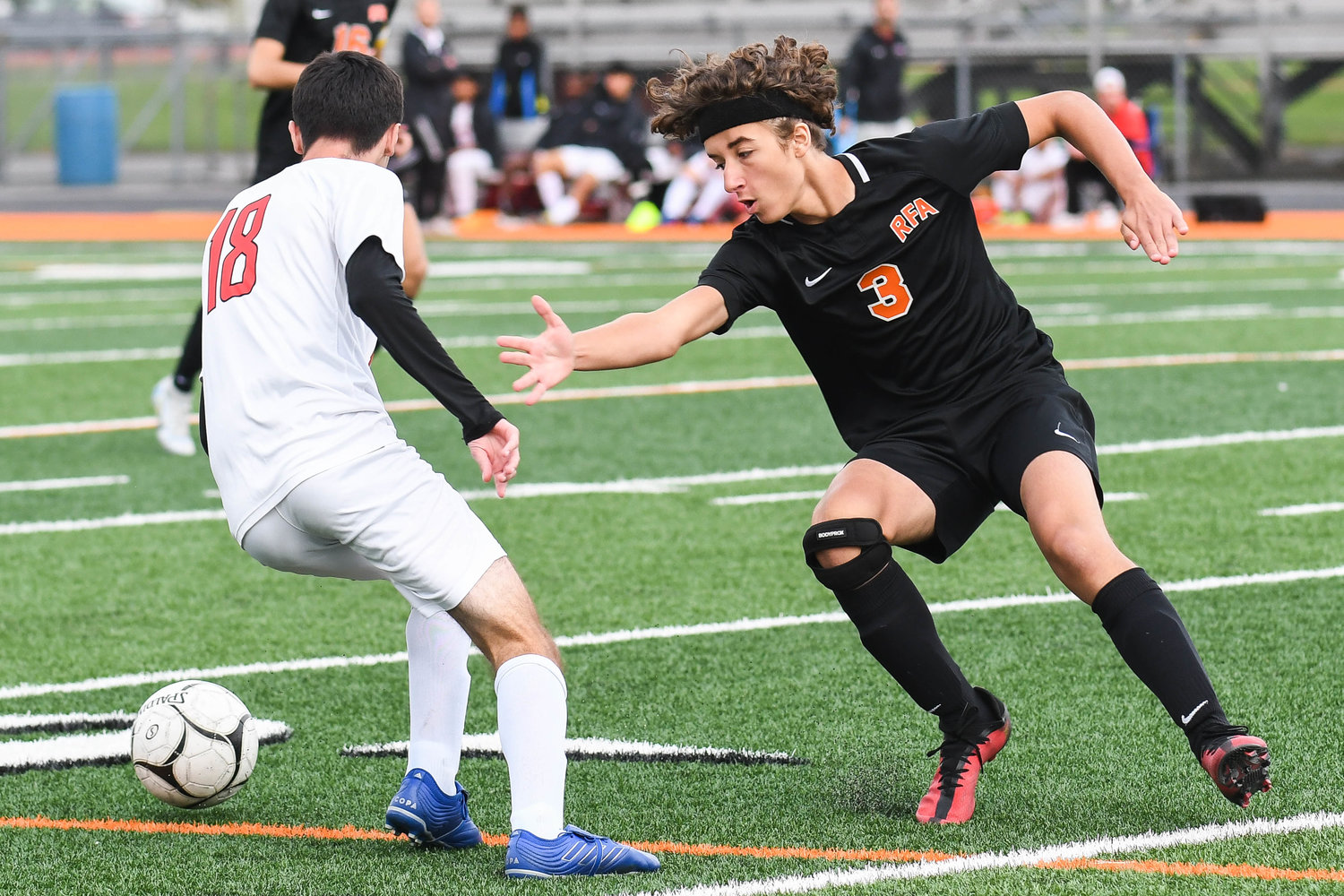 Rome Free Academy’s Noah Artigiani, right, defends Proctor’s Alan Catic during the game on Tuesday at RFA Stadium. Proctor scored once in the first half and three times in the second to get a 4-0 win. Four players had a goal for Proctor.